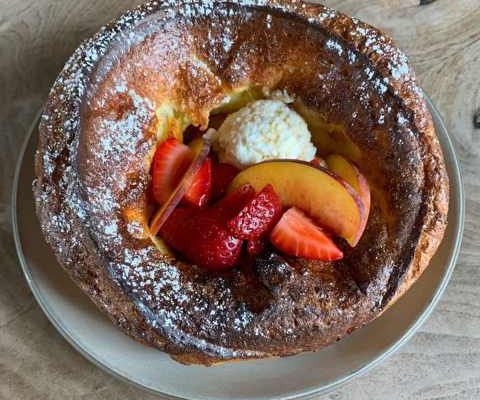 The popular dutch baby for breakfast or brunch at Outerlands San Francisco makes a decadent treat to share!